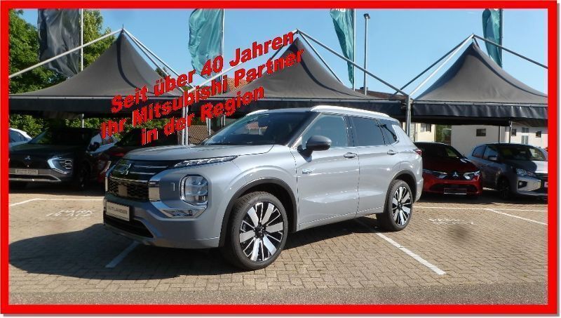 Mondsteingrau Gebraucht 2025 Mitsubishi Outlander P-HEV Top SUV | 55.490 € (Guter Preis) - Bild 1/4