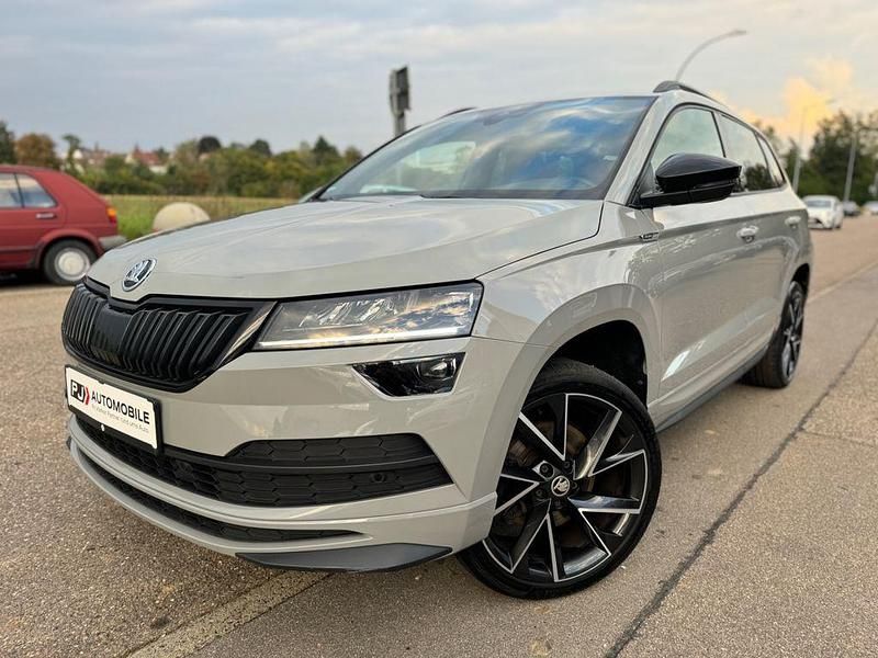 Grau Gebraucht 2020 Skoda Karoq SportLine SUV | 22.499 € (Fairer Preis) - Bild 1/4