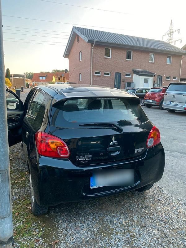 Gebraucht Mitsubishi Space Star 60 PS (44 kW) 2013 Schwarz Kleinwagen