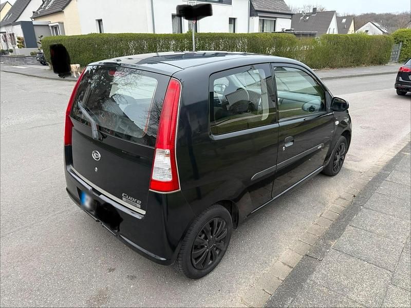 Gebraucht Daihatsu Cuore 58 PS (42 kW) 2006 Schwarz Kleinwagen