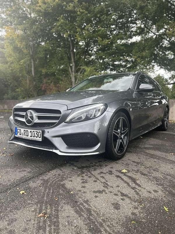 Grau Gebraucht 2017 Mercedes C220 AMG line Kombi | 19.999 € (Fairer Preis) - Bild 1/4