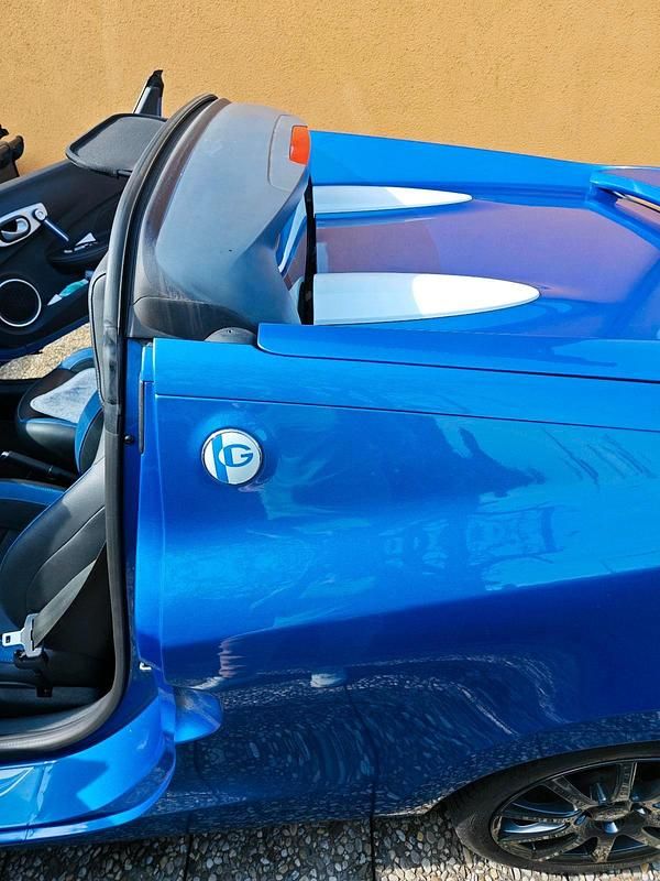 Second-hand Renault Wind 102 CP (75 kW) 2013 Albastru Cabrio