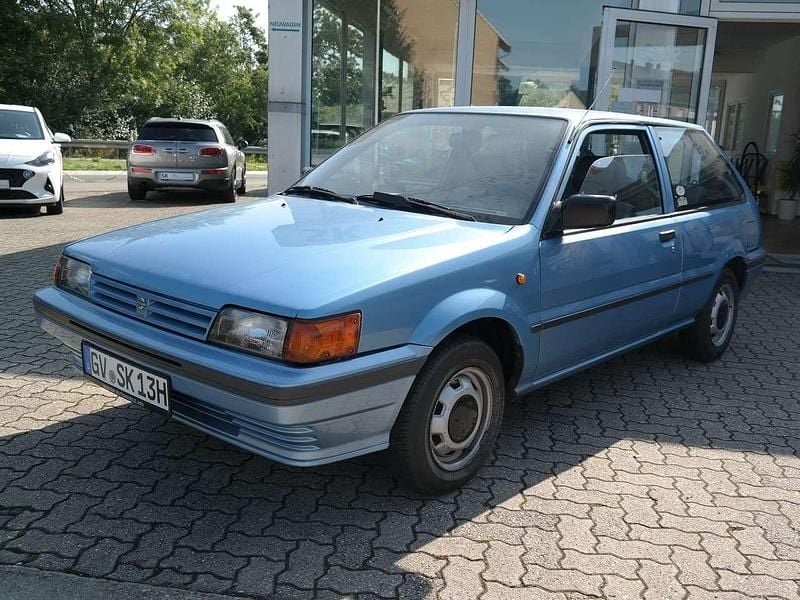Blau Gebraucht 1989 Nissan Sunny Limousine | 5.999 € - Bild 1/4