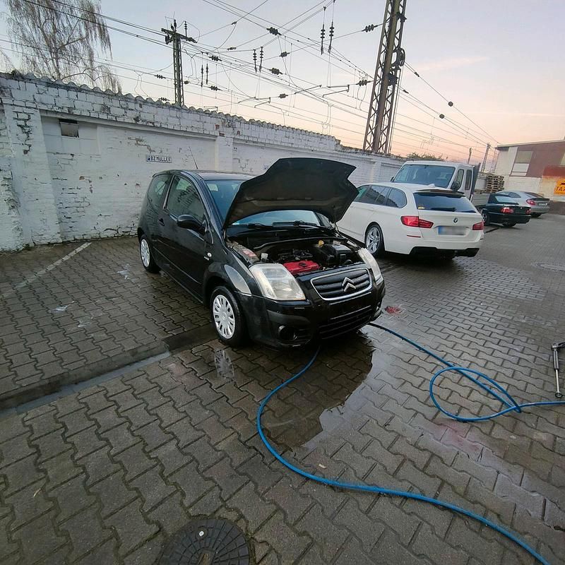 Gebraucht Citroën C2 70 PS (51 kW) 2009 Schwarz Kleinwagen