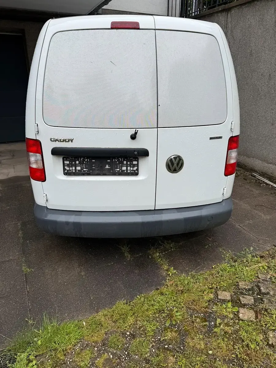 Używany VW Caddy 109 KM (80 kW) 2010 Biały Minivan
