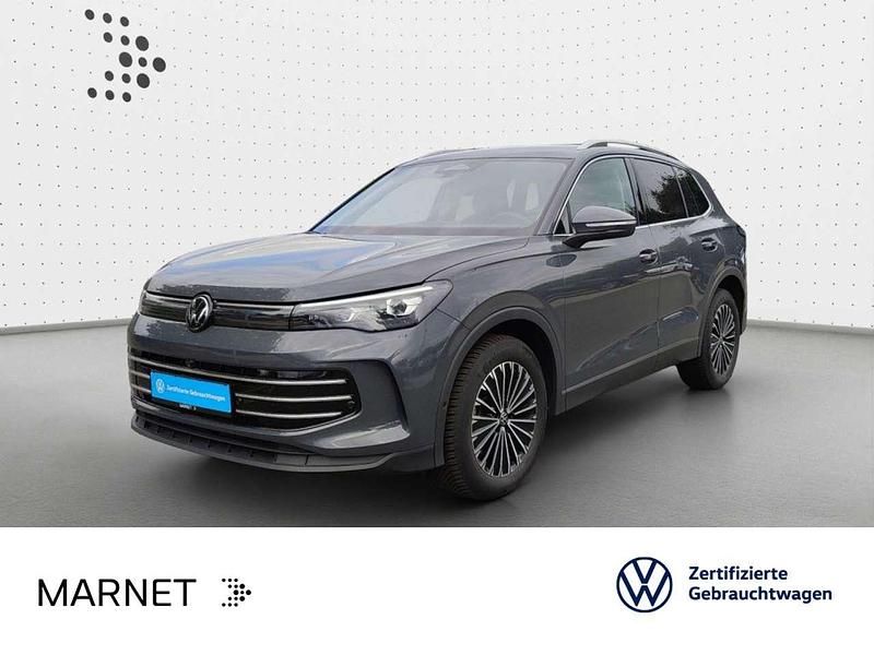 Delfingrau metallic Gebraucht 2024 VW Tiguan Elegance SUV | 37.490 € (Fairer Preis) - Bild 1/3