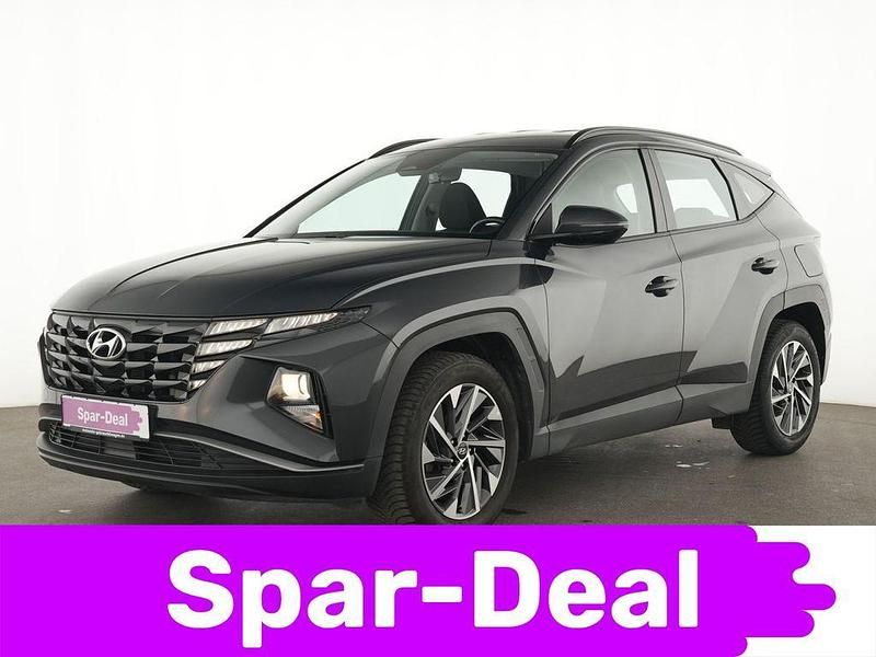 Grau Gebraucht 2021 Hyundai Tucson Select SUV | 20.245 € (Guter Preis) - Bild 1/4