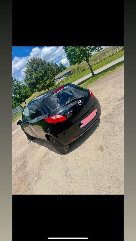 Gebraucht Mazda 2 75 PS (55 kW) 2009 Schwarz Kleinwagen
