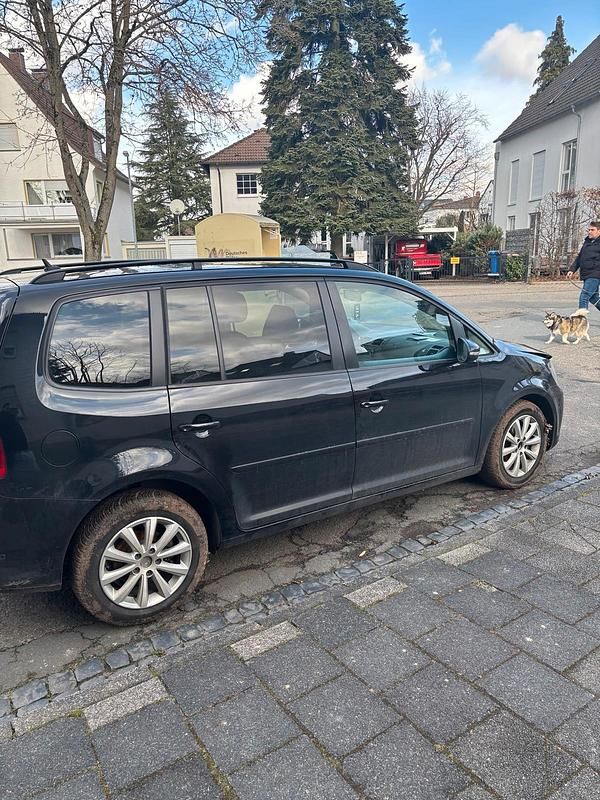 Gebraucht VW Touran 116 PS (85 kW) 2012 Schwarz Van / Kleinbus