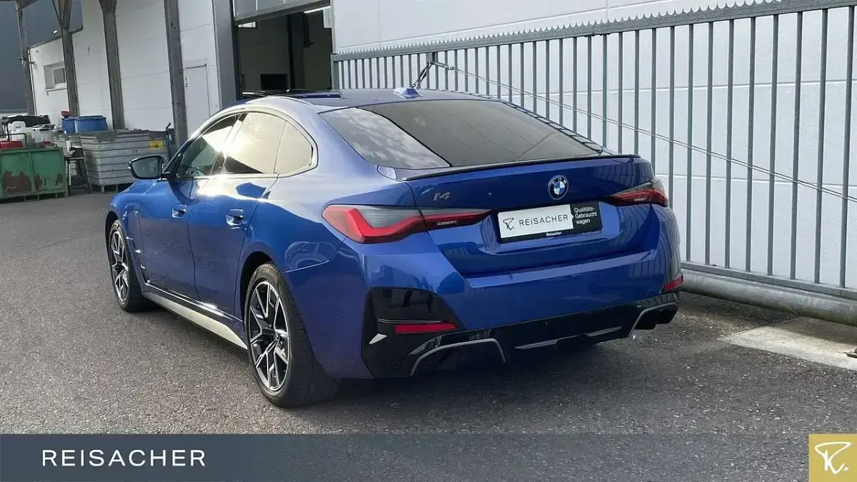 Gebraucht BMW i4 Performance 350 kW (476 PS) 2023 M portimao blau metallic Limousine