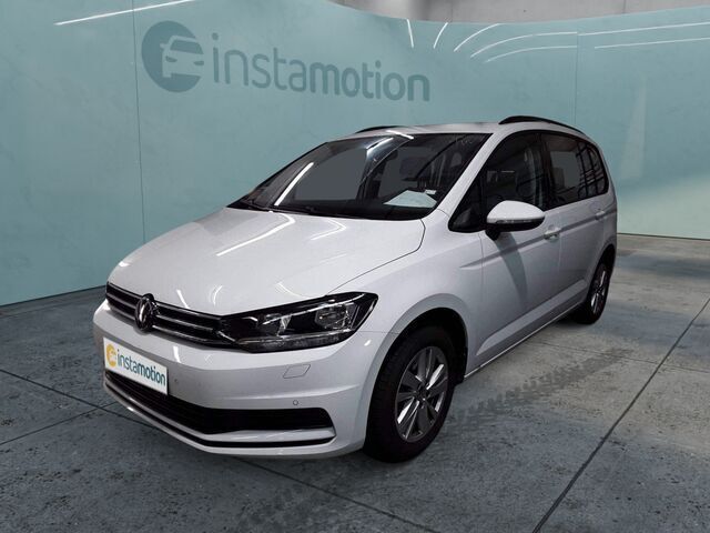 Weiß Gebraucht 2024 VW Touran Comfortline Van / Kleinbus | 31.353 € (Fairer Preis) - Bild 1/2