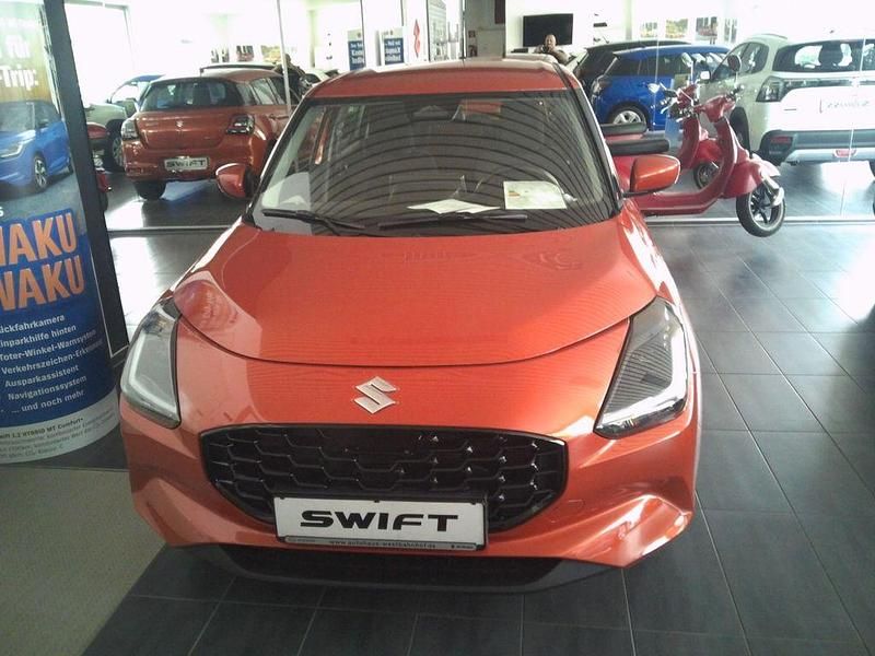 Orange Neu 2025 Suzuki Swift Club Limousine | 18.790 € - Bild 1/4