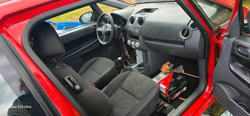 Second-hand Mitsubishi Colt 75 CP (55 kW) 2007 Roșu Hatchback