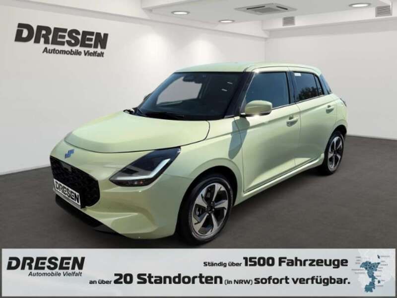 Cool yellow metallic Neu 2025 Suzuki Swift Comfort+ Kleinwagen | 21.440 € - Bild 1/4
