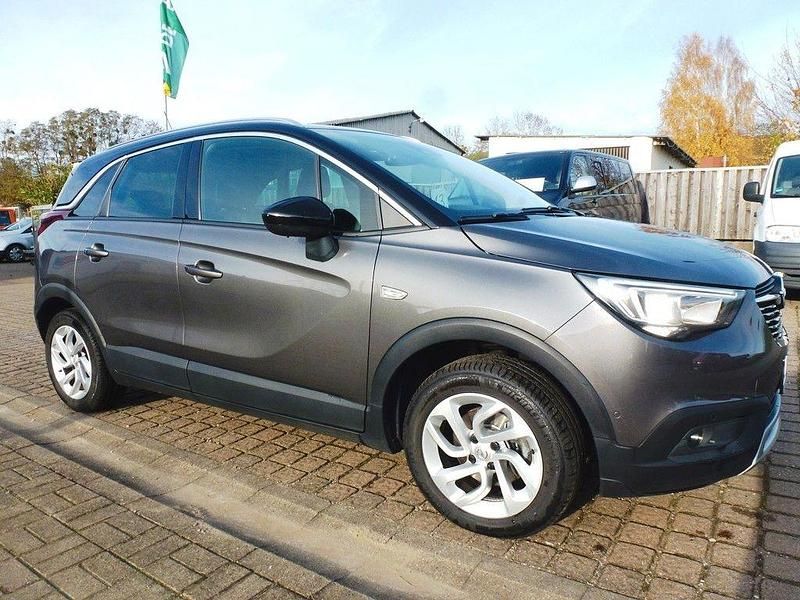 Mondstein grau/e:vulkan grau Gebraucht 2019 Opel Crossland Innovation SUV | 14.990 € (Etwas zu teuer) - Bild 1/4