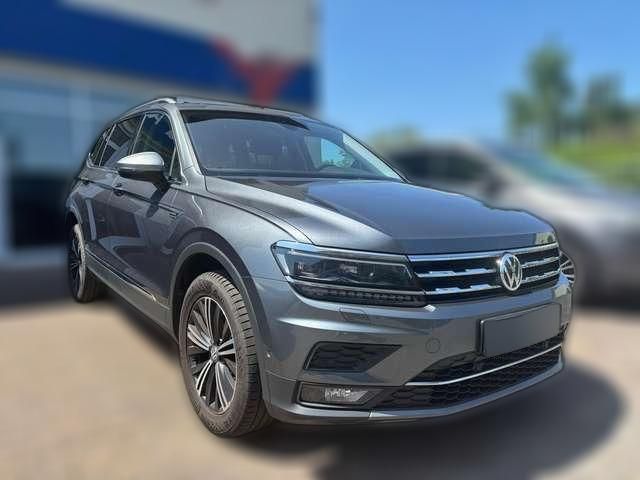 Grau metallic Gebraucht 2021 VW Tiguan Allspace Highline SUV | 35.100 € (Fairer Preis) - Bild 1/4
