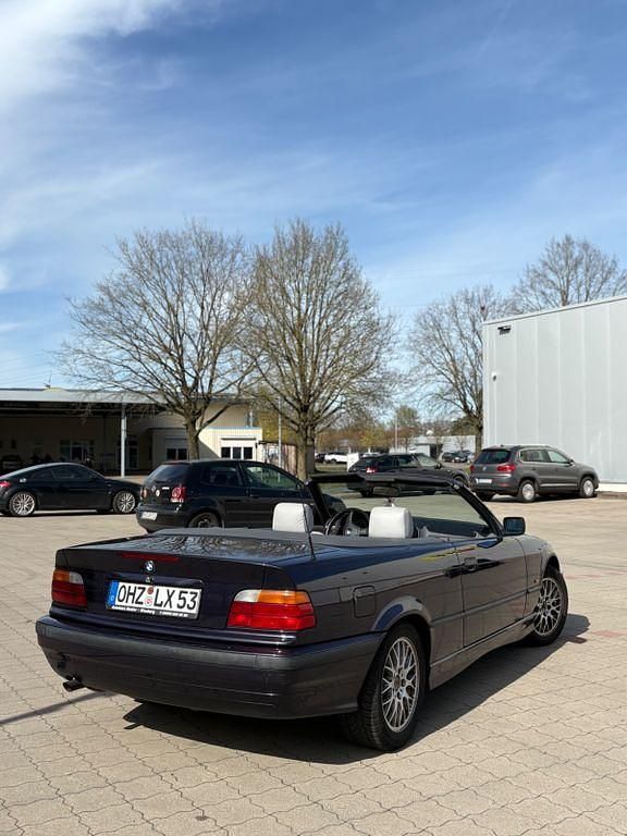 Gebraucht BMW 318 Cabriolet Basis 116 PS (85 kW) 1997 Violet Cabrio