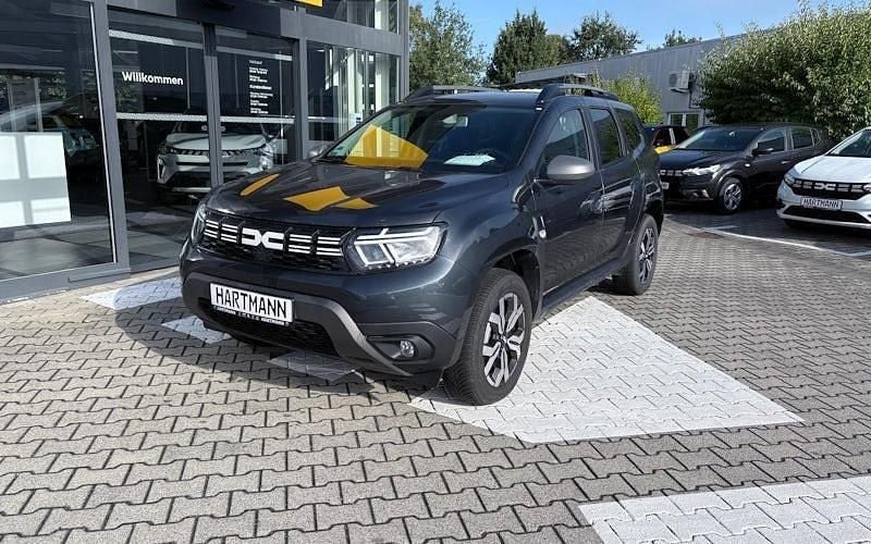 Kometengrau Gebraucht 2024 Dacia Duster Journey SUV | 23.950 € (Fairer Preis) - Bild 1/4