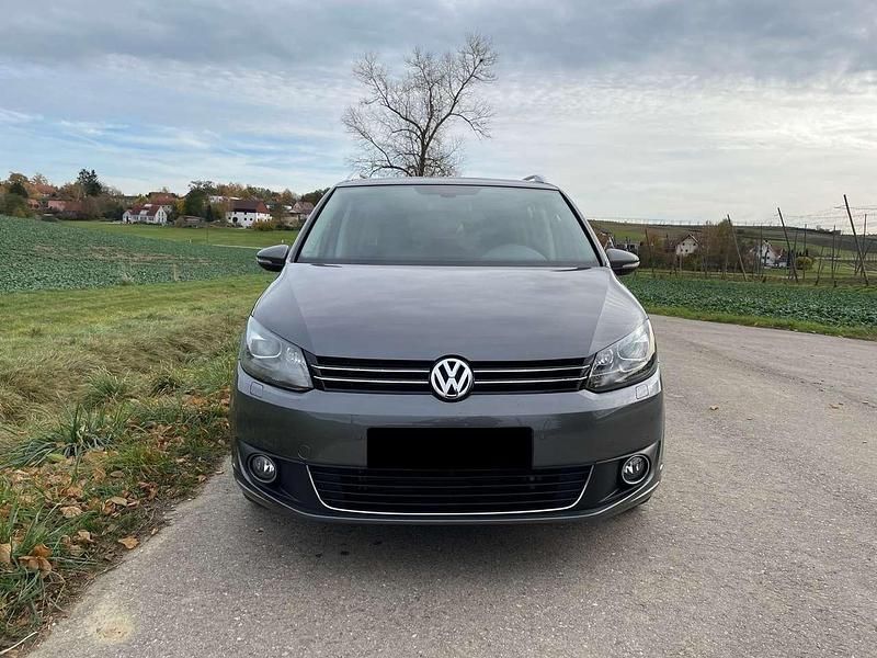 Pepper grey metallic Gebraucht 2012 VW Touran Highline Van / Kleinbus | 11.400 € (Teuer) - Bild 1/4