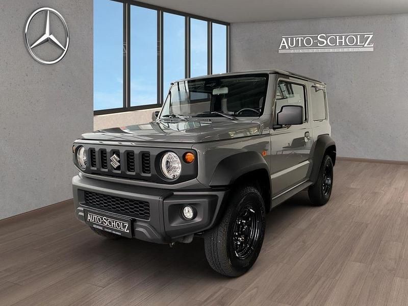 Grau Gebraucht 2023 Suzuki Jimny Comfort SUV | 32.986 € (Teuer) - Bild 1/4