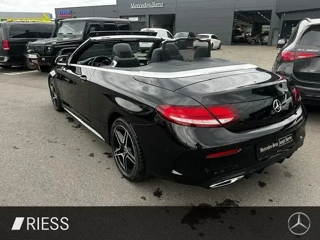 Gebraucht Mercedes C220 AMG 194 PS (142 kW) 2022 Metalliclack obsidianschwarz m Cabrio