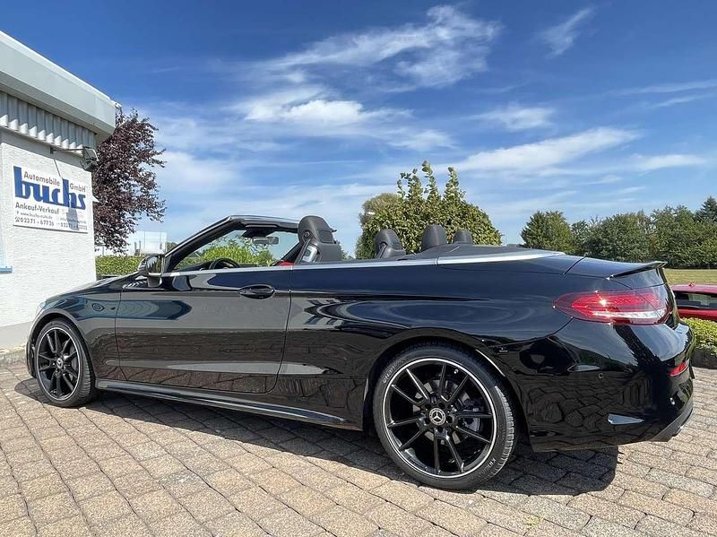 Schwarz unilack Gebraucht 2022 Mercedes C200 AMG line Cabrio | 35.900 € (Fairer Preis) - Bild 1/4