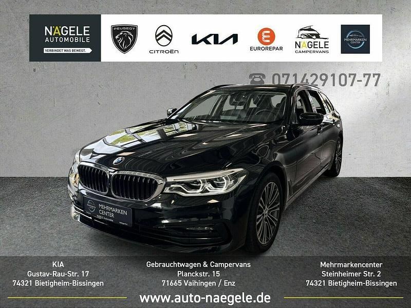 Black sapphire Gebraucht 2020 BMW 520 Sport Line Kombi | 30.400 € (Fairer Preis) - Bild 1/3