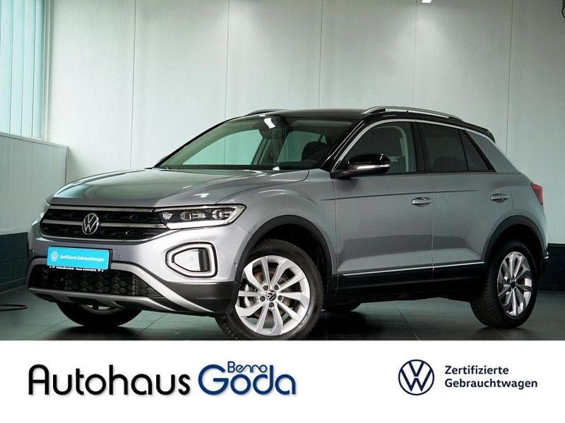 Pyritsilber (metallic) Gebraucht 2024 VW T-Roc Style SUV | 30.950 € (Fairer Preis) - Bild 1/4