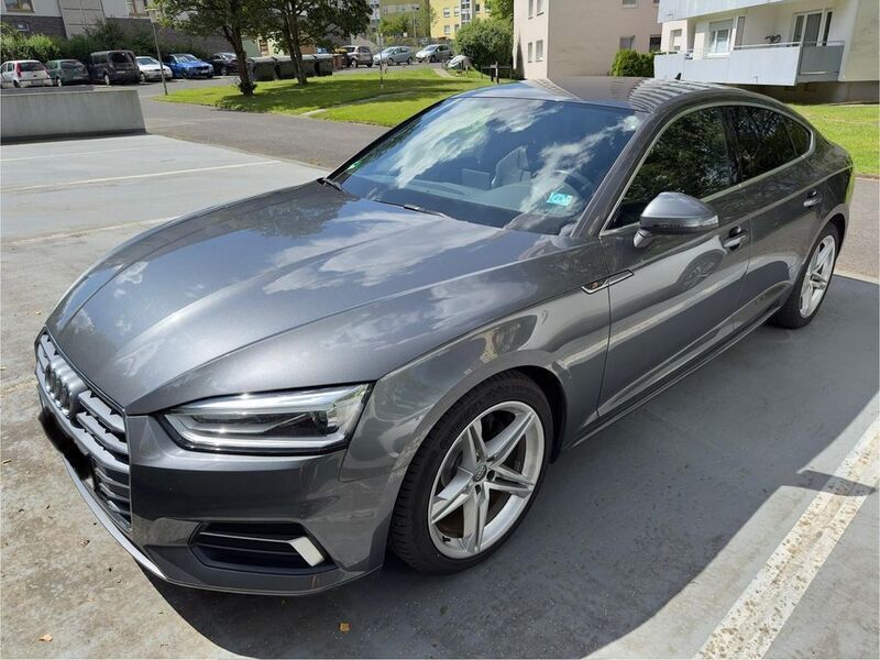 Grau Gebraucht 2018 Audi A5 Sportback Sport Limousine | 21.500 € - Bild 1/4