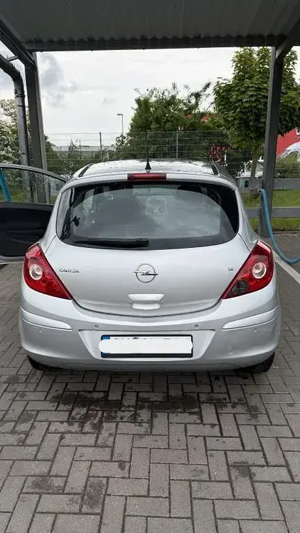 Usado Opel Corsa Catch Me 80 HP (58 kW) 2007 Prateado Citadino