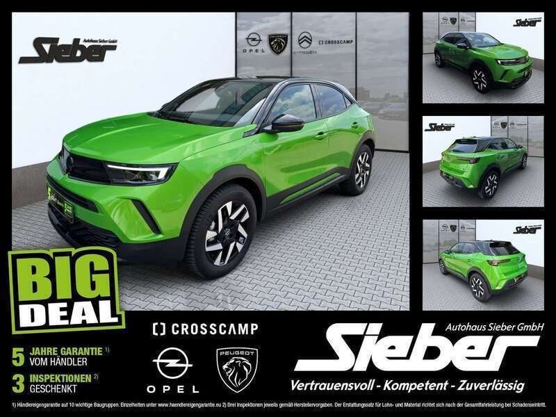 Lackierung matcha green/typ au Gebraucht 2023 Opel Mokka-e GS Line SUV | 18.990 € (Superpreis) - Bild 1/2