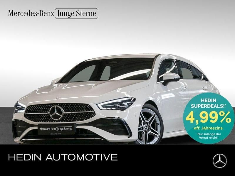 Polarweiß Gebraucht 2024 Mercedes CLA180 Shooting Brake AMG Kombi | 30.590 € - Bild 1/4