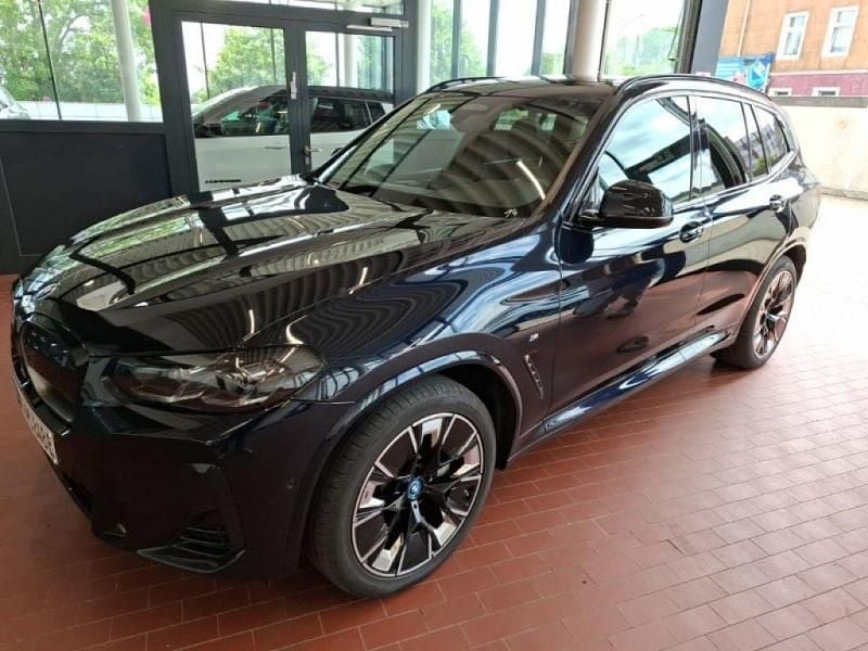 Carbonschwarz metallic Gebraucht 2023 BMW iX3 M Sport SUV | 43.900 € (Superpreis) - Bild 1/4