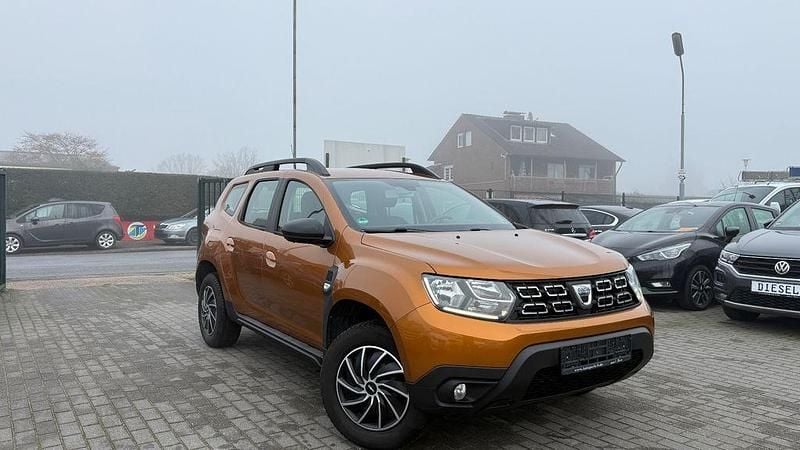 Orange Gebraucht 2018 Dacia Duster Comfort SUV | 8.900 € (Superpreis) - Bild 1/4