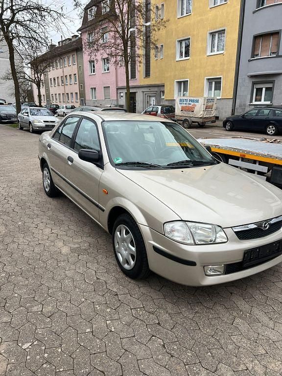 Gebraucht Mazda 323 88 PS (64 kW) 1999 Grau Limousine