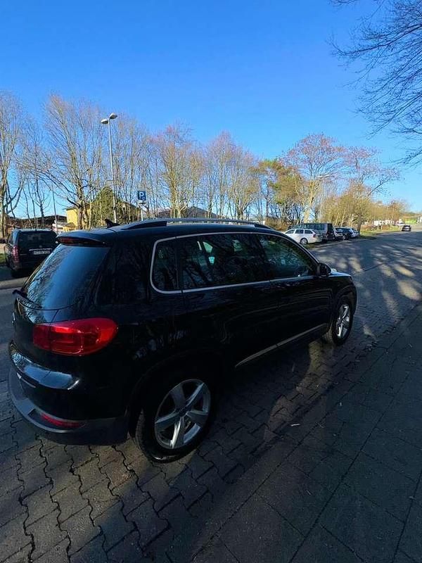 Gebraucht VW Tiguan Cup 140 PS (102 kW) 2014 Schwarz SUV