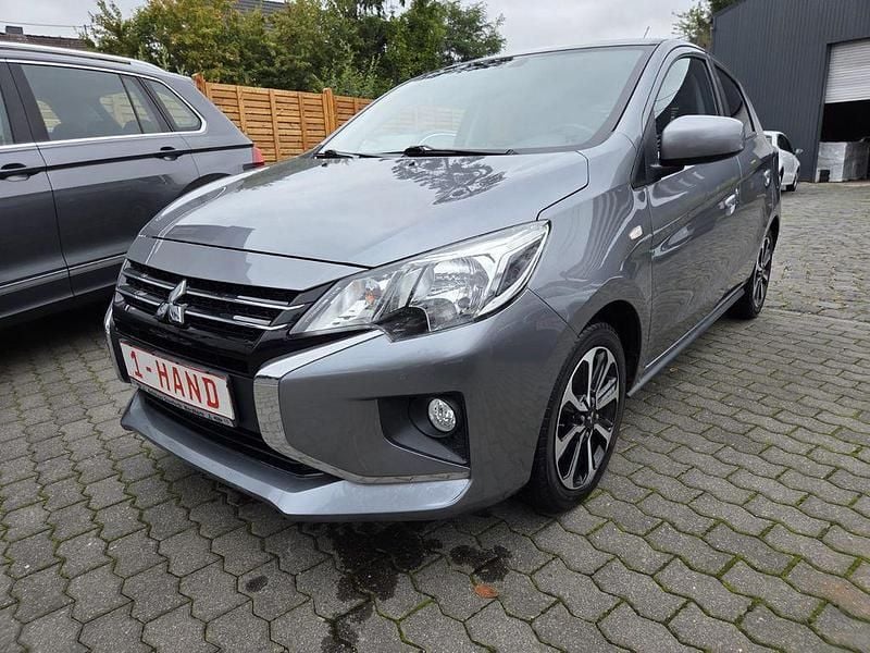 Grau Gebraucht 2021 Mitsubishi Space Star Edition+ Kleinwagen | 9.380 € (Guter Preis) - Bild 1/4