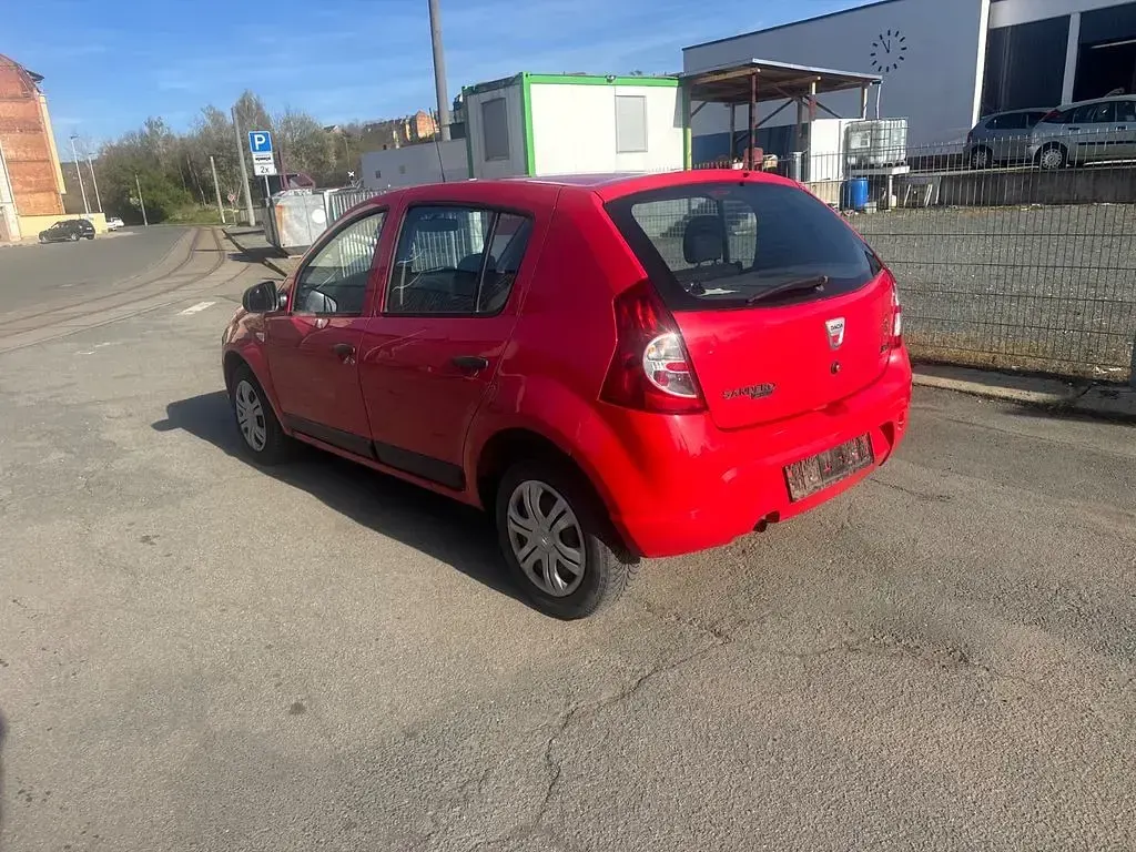 Second-hand Dacia Sandero 75 CP (55 kW) 2009 Roșu Berlinǎ