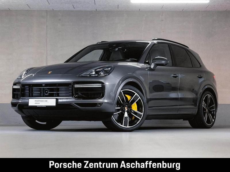 Quarzitgraumetallic Gebraucht 2022 Porsche Cayenne Turbo Sport SUV | 103.990 € - Bild 1/4