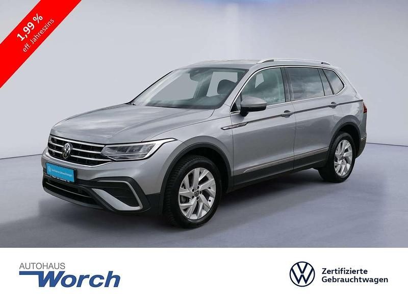 Pyritsilber metallic Gebraucht 2024 VW Tiguan Allspace Life SUV | 35.889 € (Superpreis) - Bild 1/3