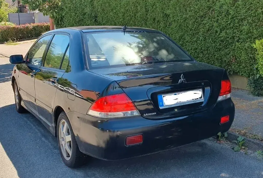 Gebraucht Mitsubishi Lancer 98 PS (72 kW) 2006 Schwarz Kombi