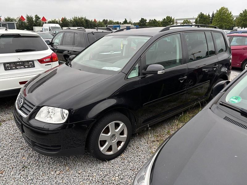 Schwarz Gebraucht 2006 VW Touran Goal Van / Kleinbus | 999 € - Bild 1/4