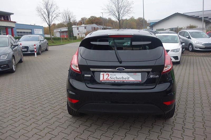 Gebraucht Ford Fiesta Individual 125 PS (91 kW) 2014 Schwarz Kleinwagen