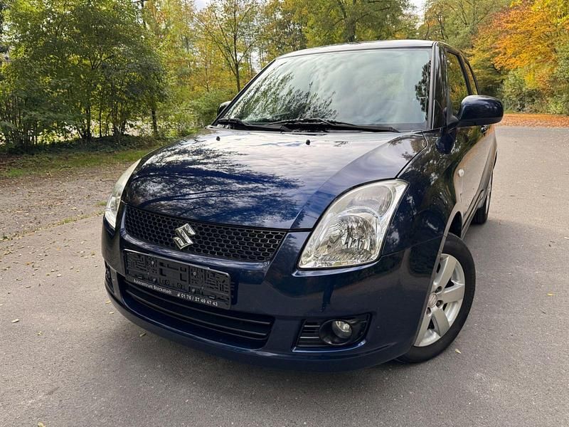 Blau Gebraucht 2010 Suzuki Swift Kleinwagen | 5.890 € (Teuer) - Bild 1/4