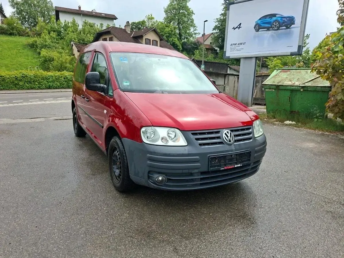 Używany VW Caddy 105 KM (77 kW) 2006 Czerwony Minivan
