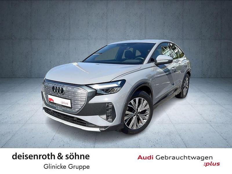Grau Gebraucht 2022 Audi Q4 Sportback e-tron Sport SUV | 26.960 € (Fairer Preis) - Bild 1/4