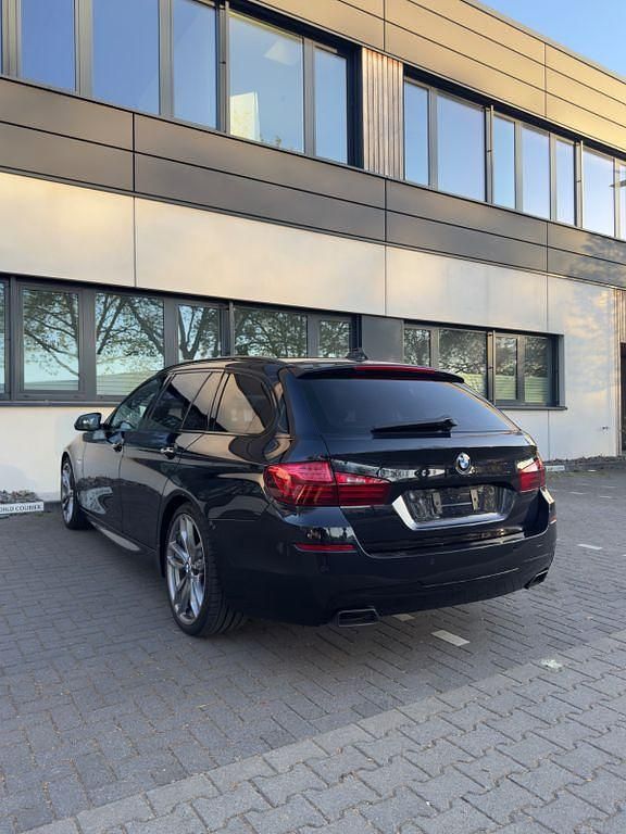 Używany BMW M550 Performance 381 KM (280 kW) 2014 Czarny Sedan/Limuzyna
