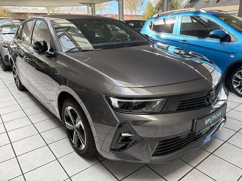 Gebraucht Opel Astra 131 PS (96 kW) 2024 Mondsteingrau metallic (metallic) Kombi