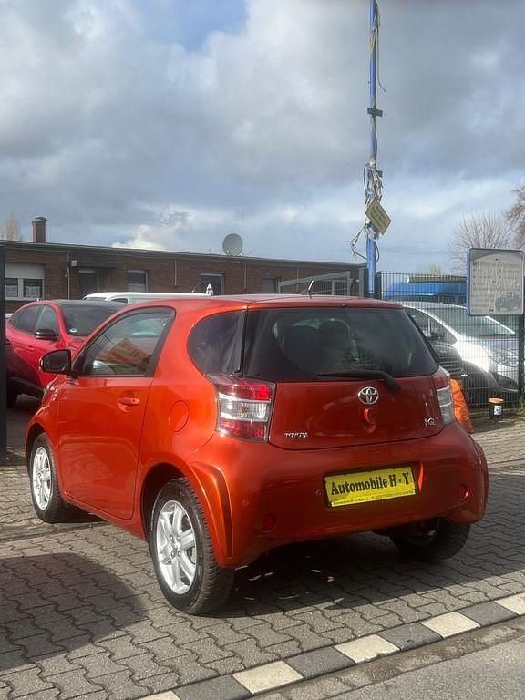 Gebraucht Toyota iQ 68 PS (50 kW) 2012 Orange Kleinwagen