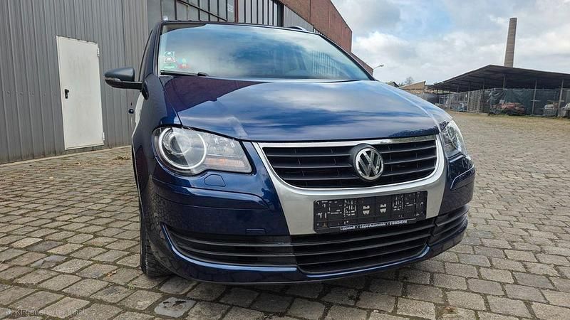 Blau Gebraucht 2010 VW Touran Freestyle Van / Kleinbus | 5.900 € (Fairer Preis) - Bild 1/4